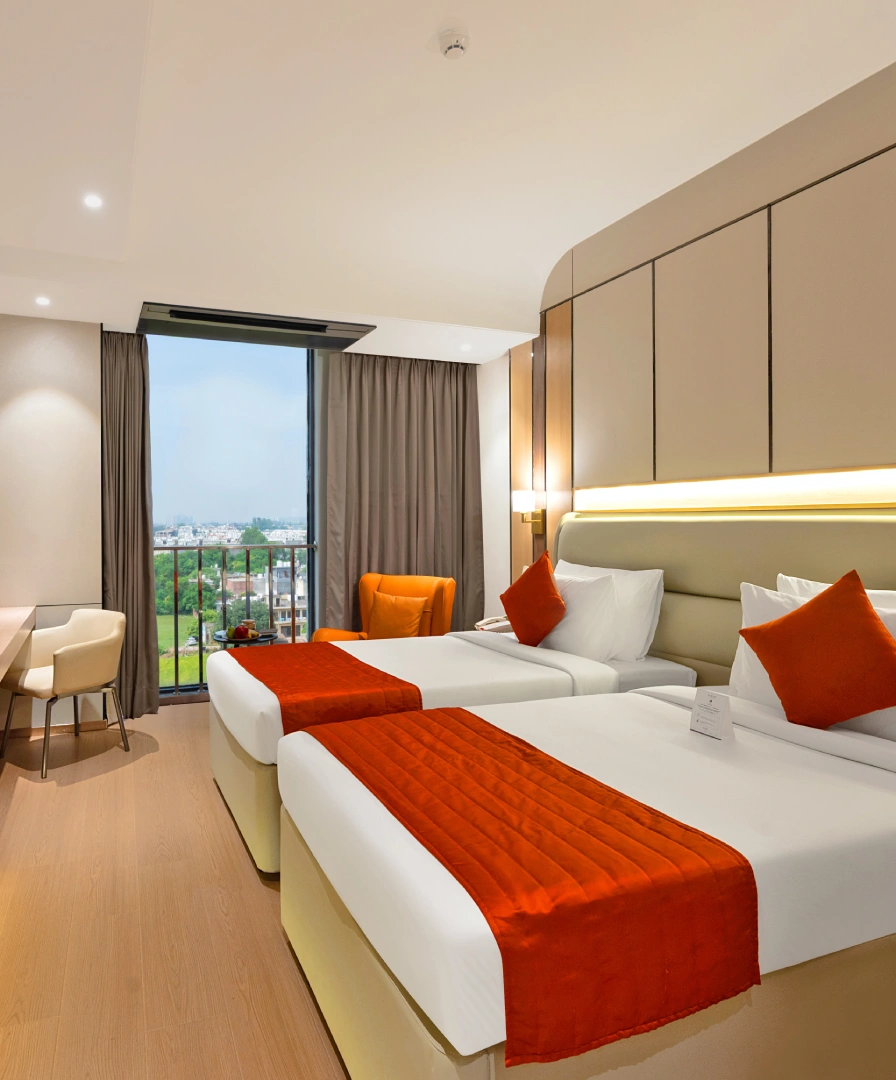 Book Deluxe Twin Room at Orchid Hotel Chandigarh – Twin bed hotel room in Zirakpur for business travelers Deluxe Twin Room at Orchid Hotel Chandigarh Zirakpur with twin beds – perfect hotel room in Chandigarh for friends, colleagues and corporate stays, book now
