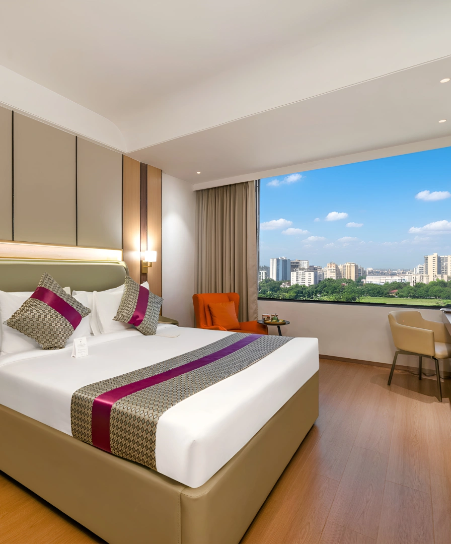 Book Premier Room at Orchid Hotel Chandigarh – Upscale hotel room in Zirakpur near Chandigarh Airport Premier Room at Orchid Hotel Chandigarh Zirakpur – elegant and upscale hotel room in Chandigarh near airport with workspace and modern comforts, book online