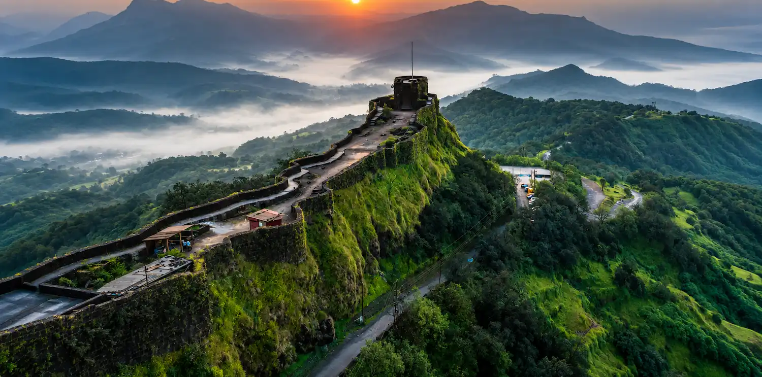 Plan a Weekend Stay in Pune for Fort Treks | The Orchid Hotel Pune Historic fort trekking experiences near Pune in the Sahyadri hills