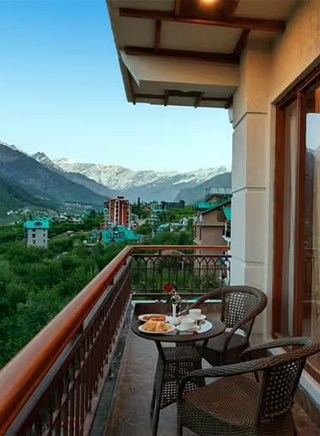 Book Hotel in Manali Himachal Pradesh – Luxury Room with Valley View Luxury hotel room in Manali offering stunning valley views and premium accommodation at Orchid Hotel