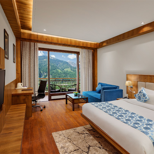 Book Hotel in Manali – Luxury Suites with Valley & River View Luxury suites in Manali with balcony overlooking mountain views – Hotel in Shuru Manali