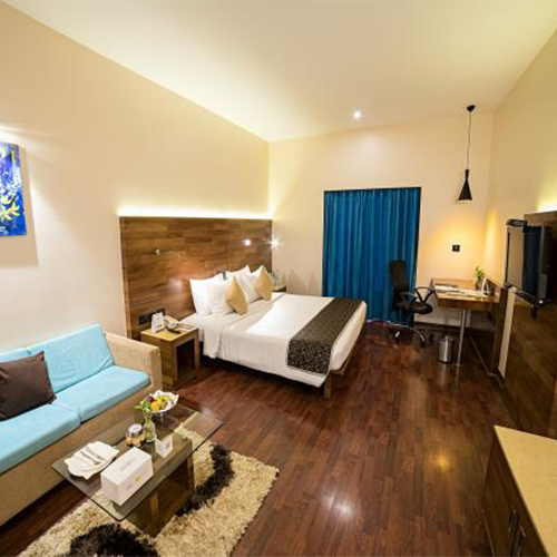 Bedroom – Orchid Hotel Pune Stay Bedroom at The Orchid Hotel Pune – Comfortable Hotel Stay Near Baner and Balewadi