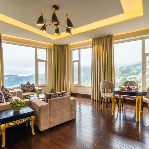 Luxury hotel in Shimla – Reserve panoramic rooms at The Orchid Hotel Hotel room in Shimla with large windows and spectacular mountain views | Book hotel stay