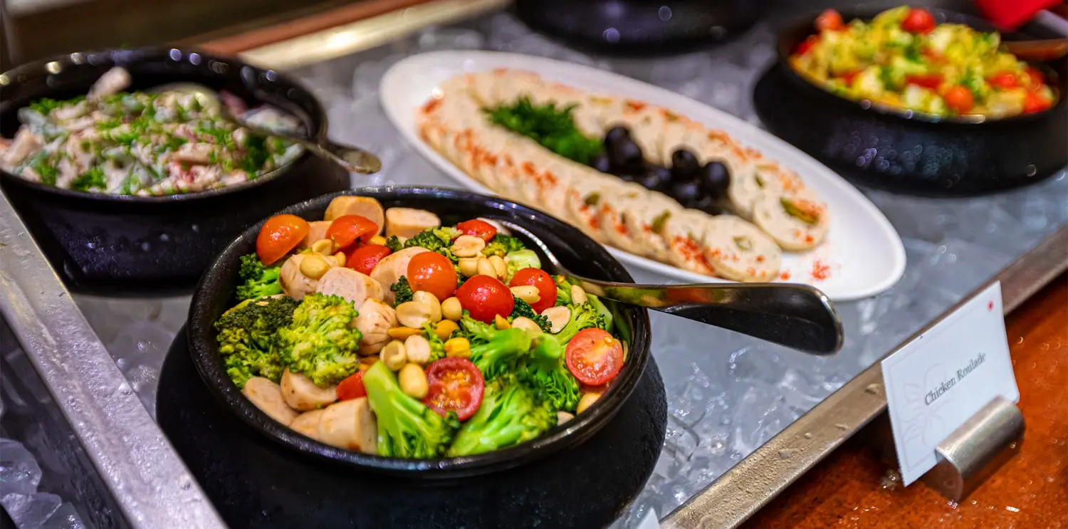 Indulge in a gourmet meal at Orchid – Book your dining experience now! Elegant restaurant interiors at Orchid Hotels – Gourmet meals and warm hospitality