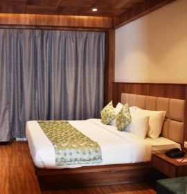 Luxury Hotel in Manali – Book Club Room at Orchid Hotels Club Room with balcony and stunning valley views at Orchid Hotel Manali for a luxurious retreat