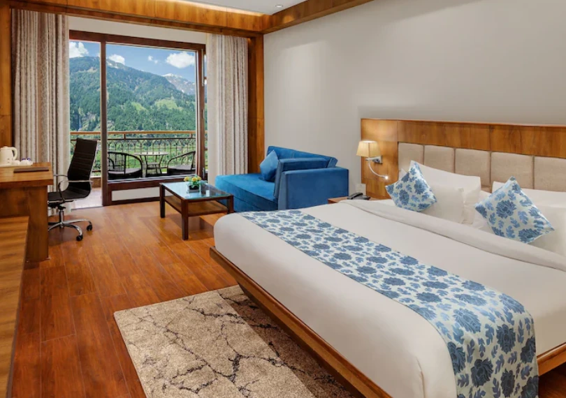 Mountain View Hotels in Manali – Book Hotel in Manali Online Premier Valley View Room with private balcony overlooking scenic valleys at Orchid Hotel Manali