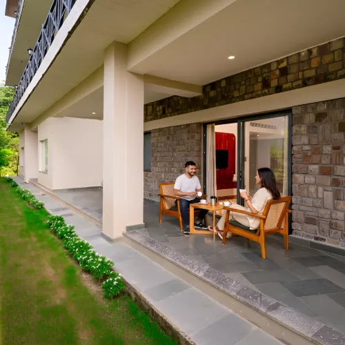 Book a stay at Orchid Rishivan Resort, premium Rishikesh hotel with balcony sitting area Balcony sitting area at Orchid Rishivan Resort in Rishikesh - luxury resort near Byasi