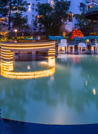 Swimming Pool & Leisure at Orchid Hotel Panchgani – Perfect for Families & Couples Outdoor swimming pool at Orchid Hotel Panchgani with valley views