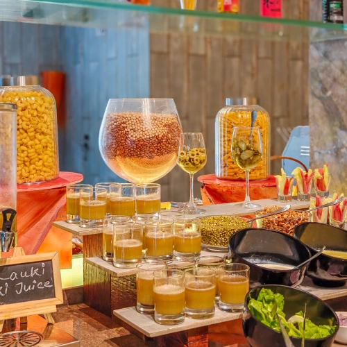 Breakfast Buffet – Orchid Panchgani Dining Fresh juice and breakfast buffet station at Orchid Hotel Panchgani restaurant